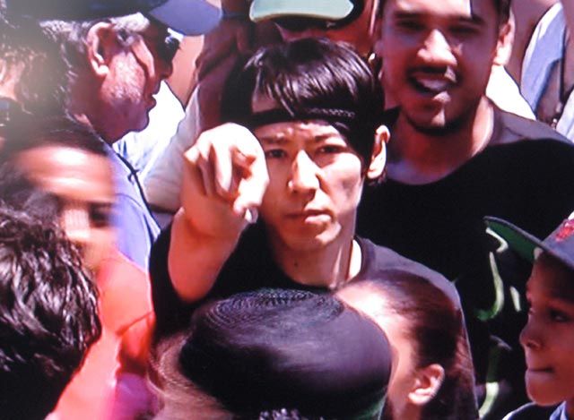 Kobayashi in the crowd (before the arrest